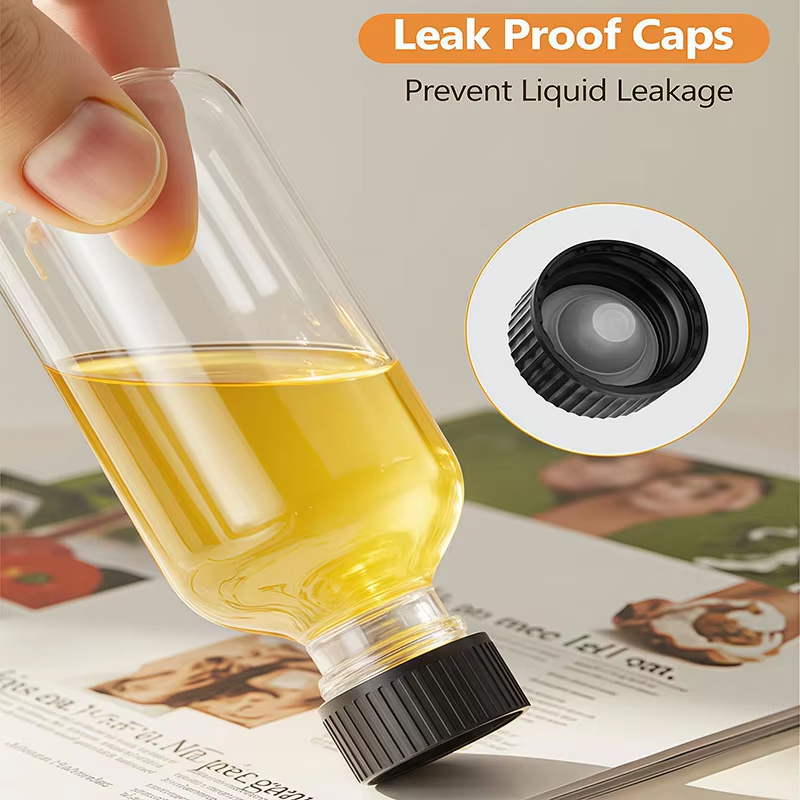 زجاجات مشروبات زجاجية شفافة سعة 60 مل، غطاء لولبي مستدير، طباعة الشاشة قابلة لإعادة التعبئة للعصير 