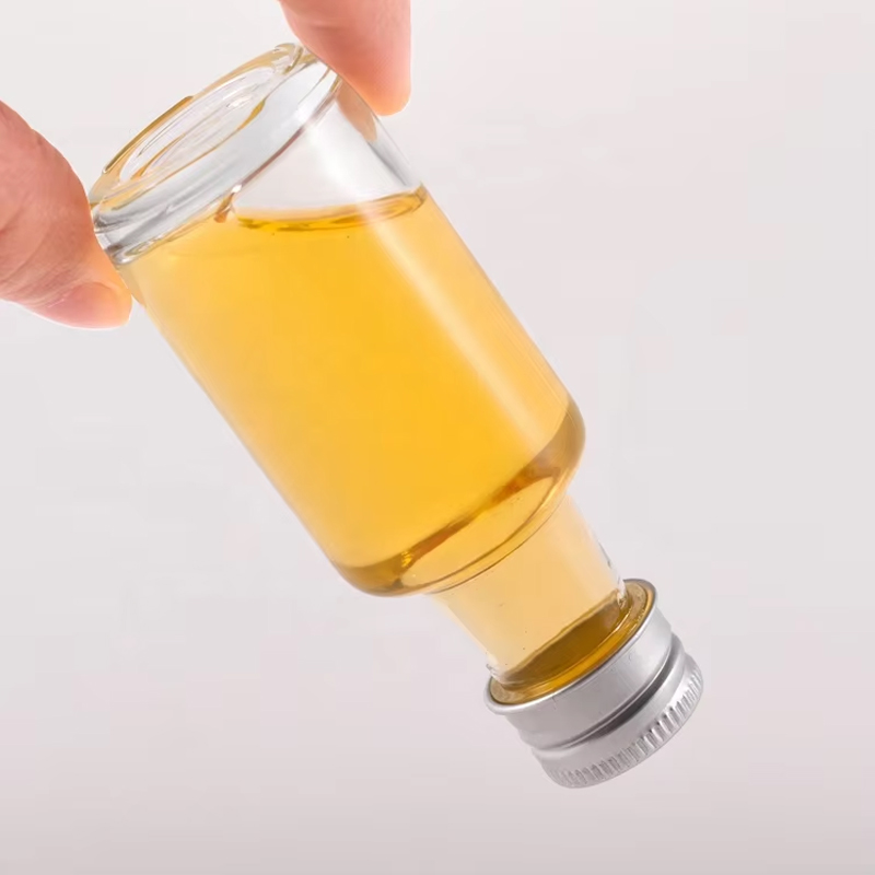 زجاجات الخمور الزجاجية الصغيرة ذات الأغطية