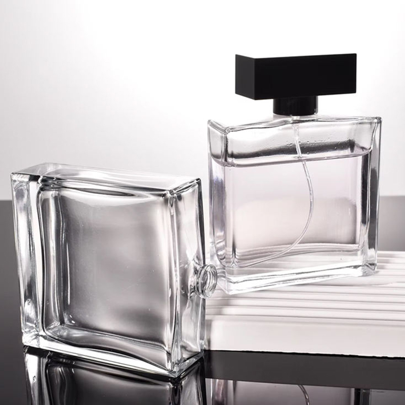 50 مل 100 مل زجاجة عطر زجاجية شفافة مسطحة مربعة الشكل فاخرة 