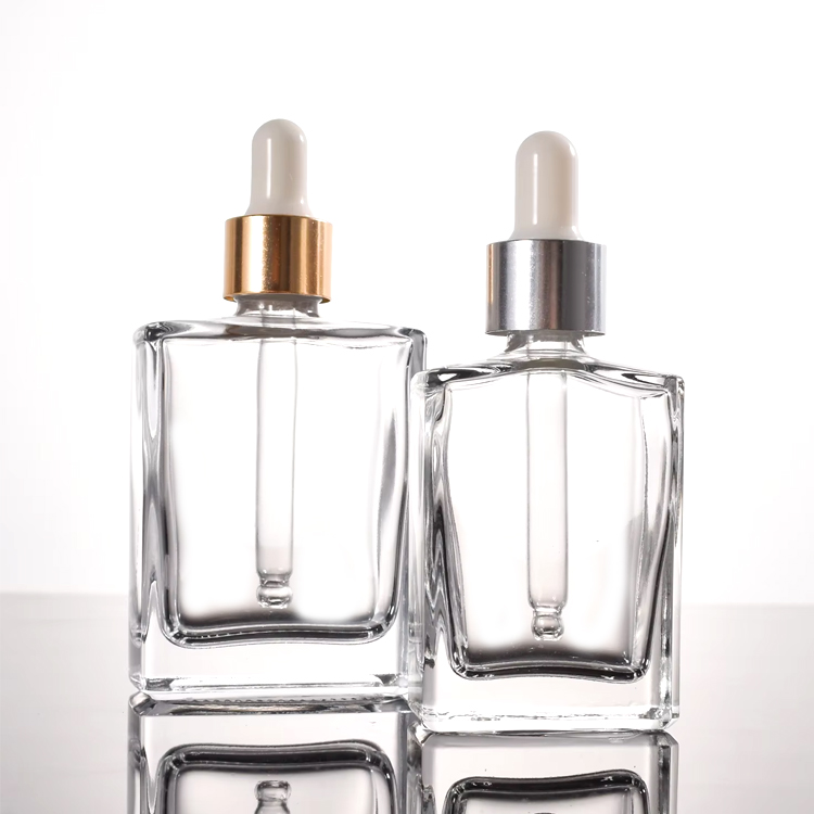 زجاجة قطارة عطر زجاجية مستطيلة الشكل ومسطحة فريدة من نوعها، شفافة