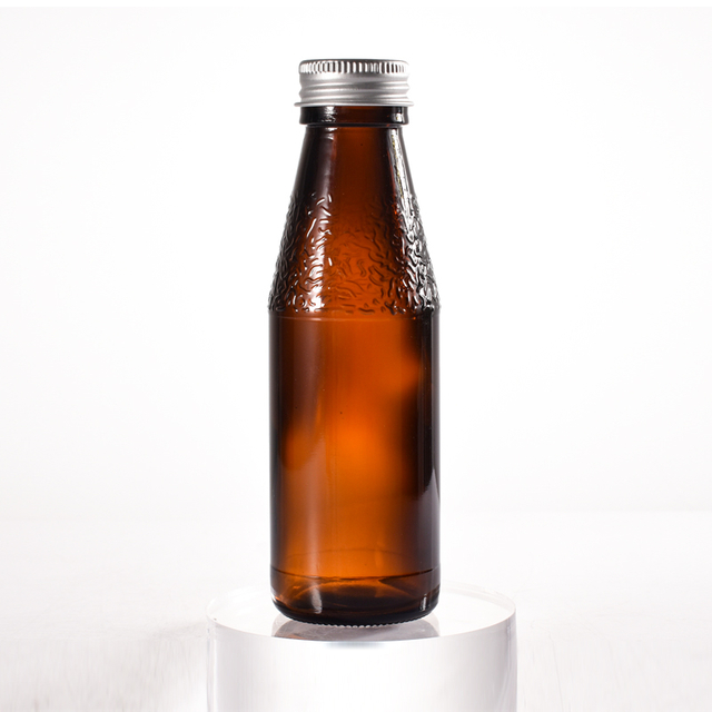 الشركة المصنعة 100 مل من الزجاج المختوم لإعادة تدوير زجاجات شراب زجاج العنبر مع غطاء معدني